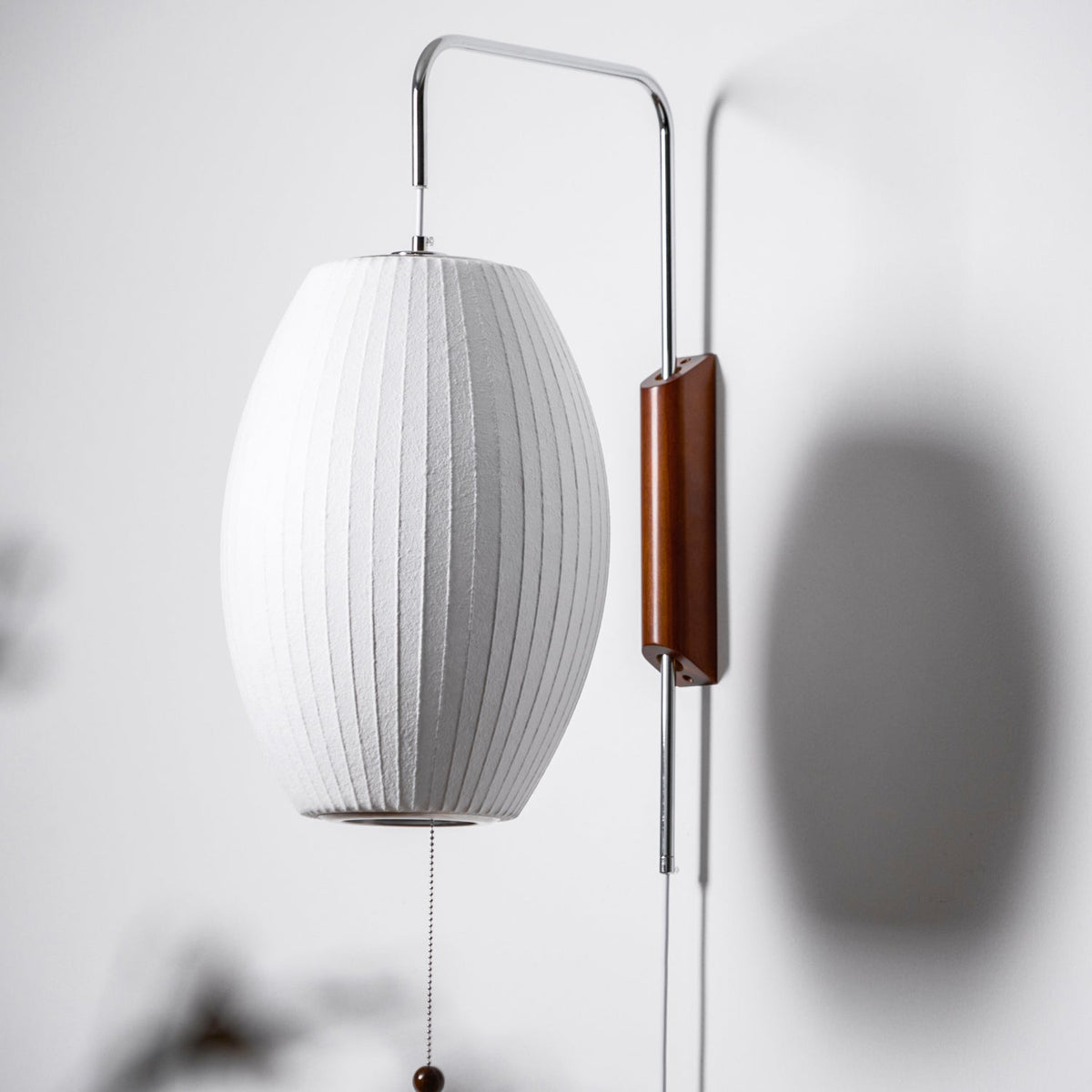 Bubble Ball Plug In Swing Arm Wall Sconce